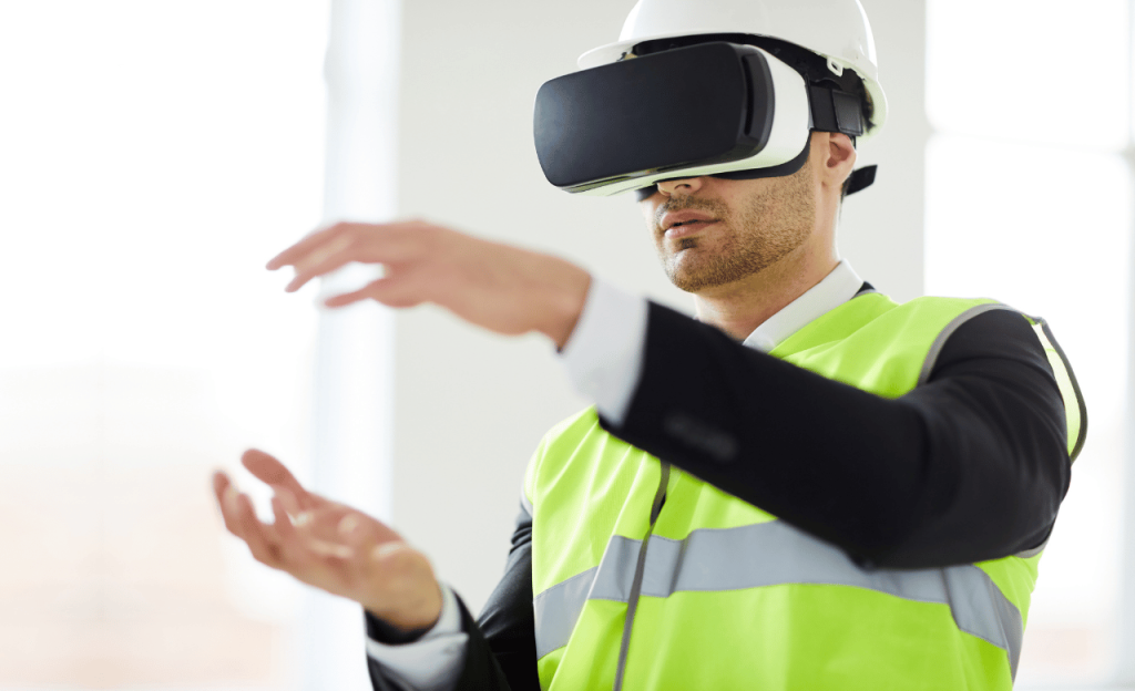 Man at a construction site using VR to experience the finished result.